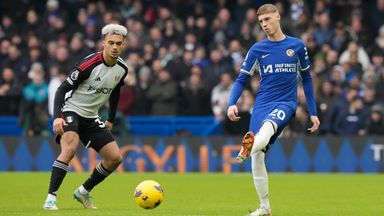 Chelsea's Cole Palmer controls the ball under pressure from Fulham's Antonee Robinson (AP)
